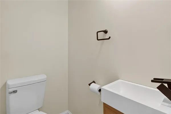 a bathroom with a sink and a toilet