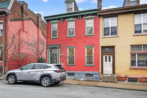 a car parked in front of a building