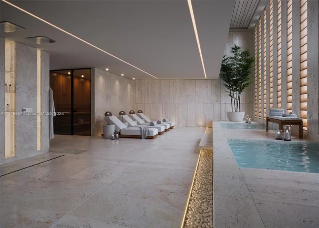 a view of a hallway with seating area