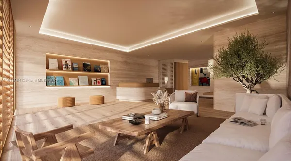 a living room with furniture and a book shelf