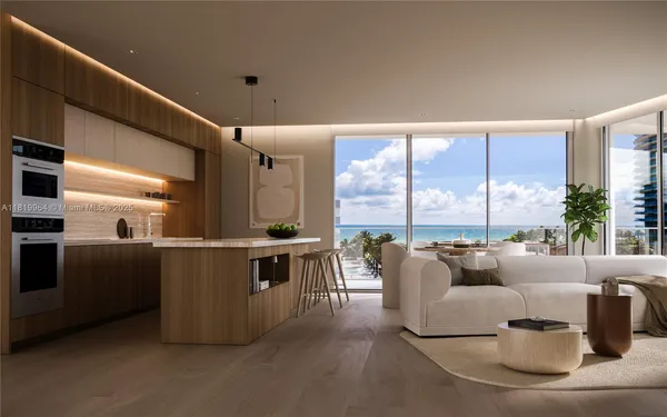 a living room with furniture a large window with kitchen view