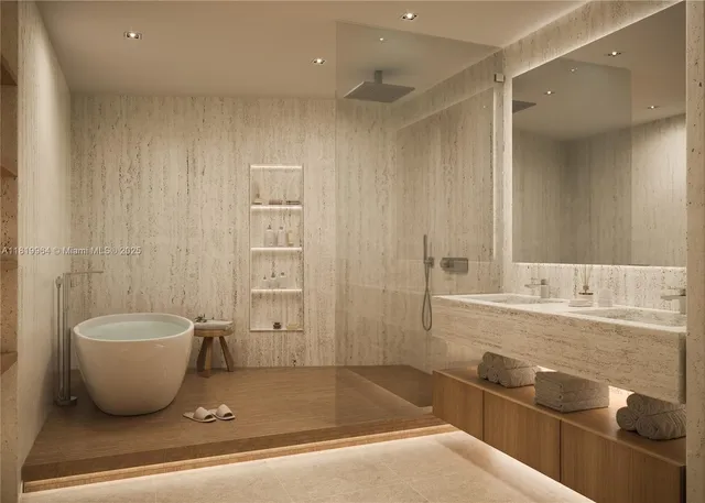a spacious bathroom with a granite countertop sink a toilet and bathtub