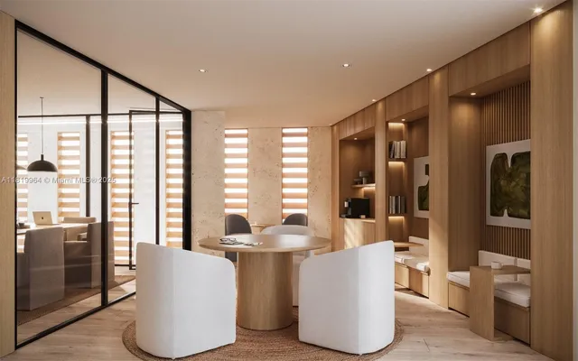 a living room with furniture and large windows