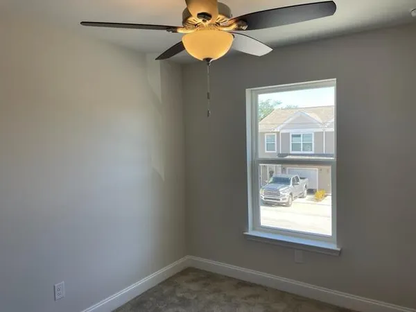 a view of a room with a window