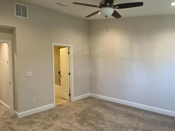 an empty room with a door