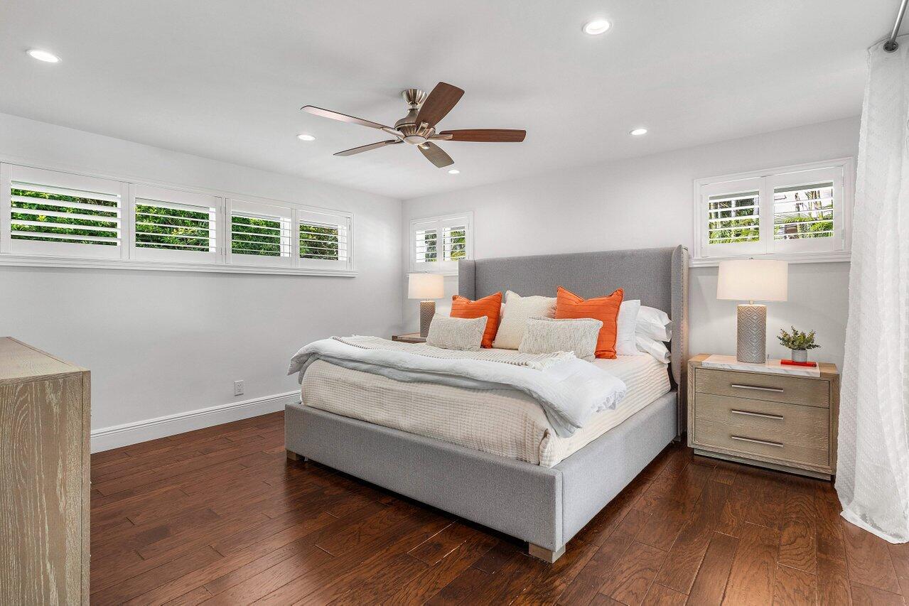 6130 Ridge Lane Ocean Ridge, FL 33435 - Photo 15 of 33 a bedroom with a bed and a window