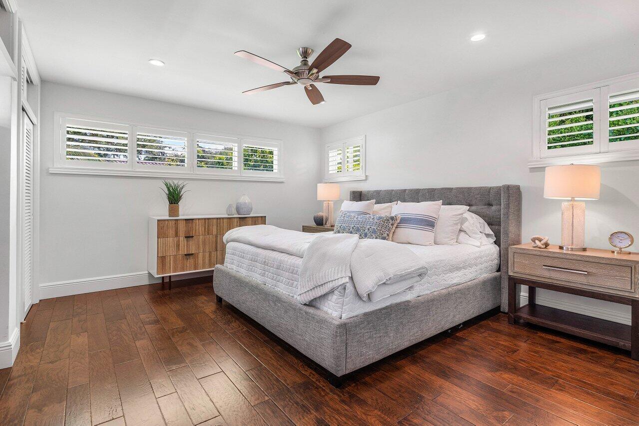 6130 Ridge Lane Ocean Ridge, FL 33435 - Photo 19 of 33 a bedroom with a bed and window