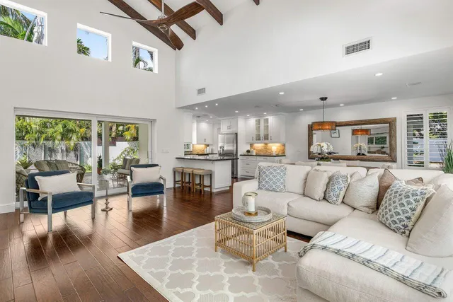 a view of backyard with a garden and trees