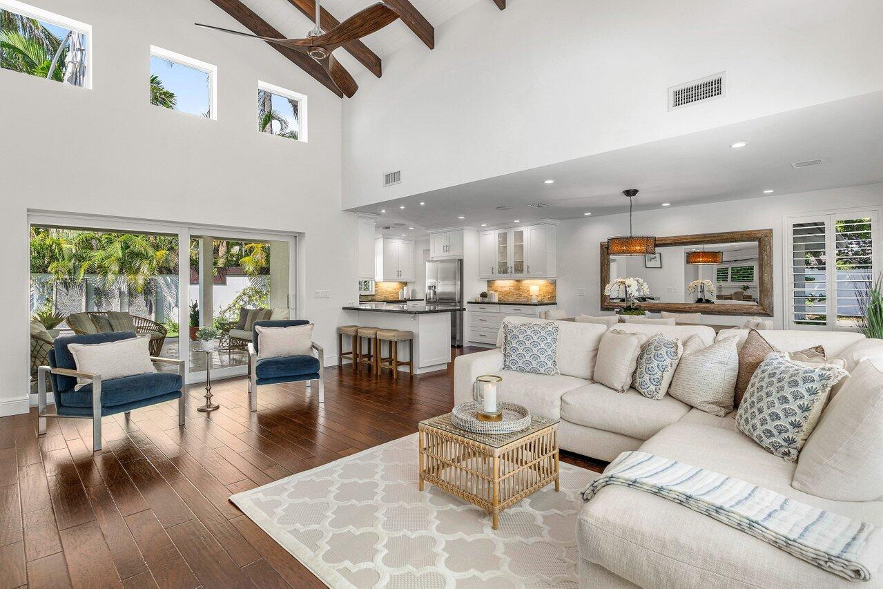 6130 Ridge Lane Ocean Ridge, FL 33435 - Photo 24 of 33 a living room with furniture and a large window