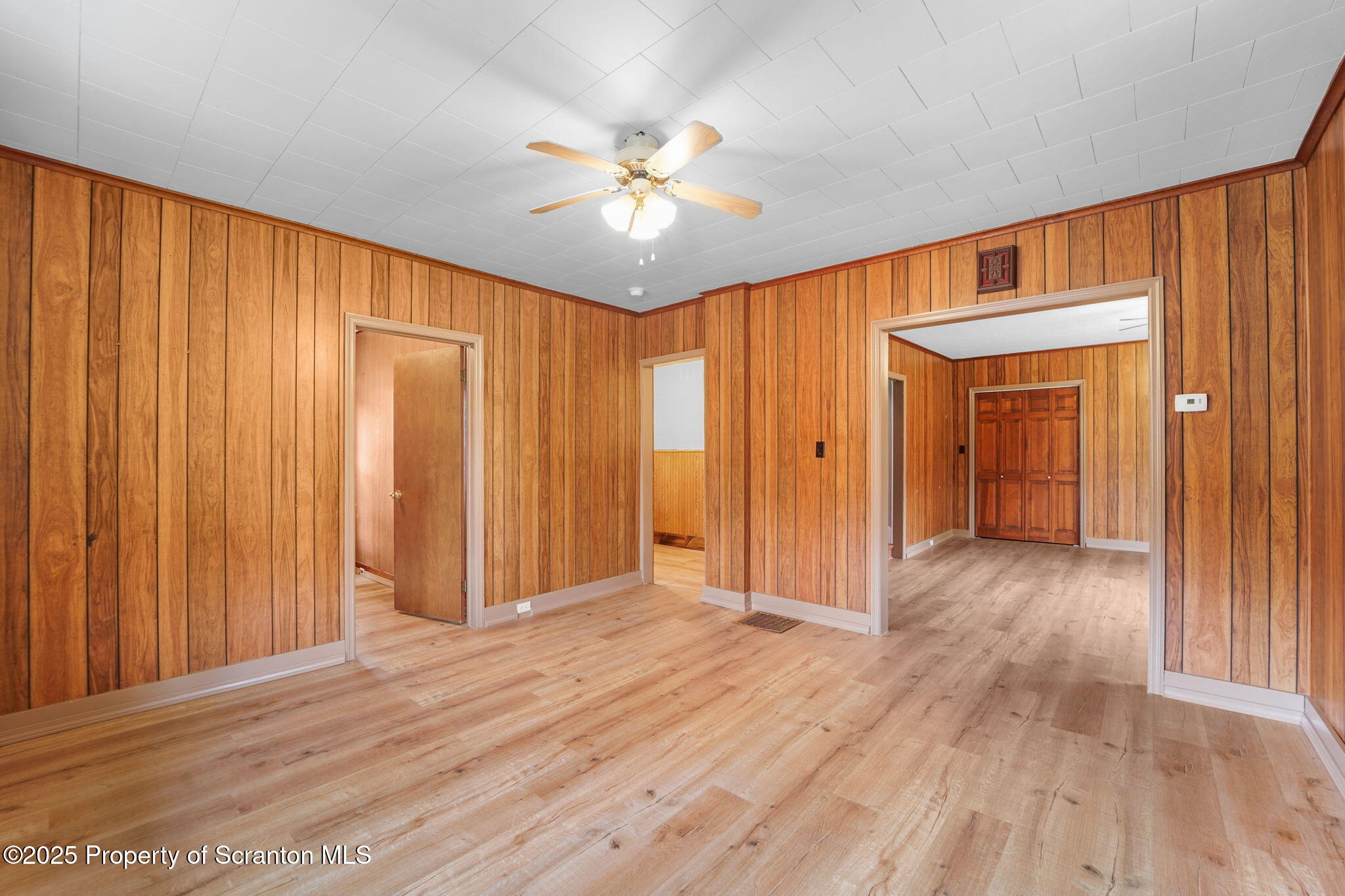 117 Church Road Harford, PA 18823 - Photo 12 of 35 wooden floor in an empty room with a window