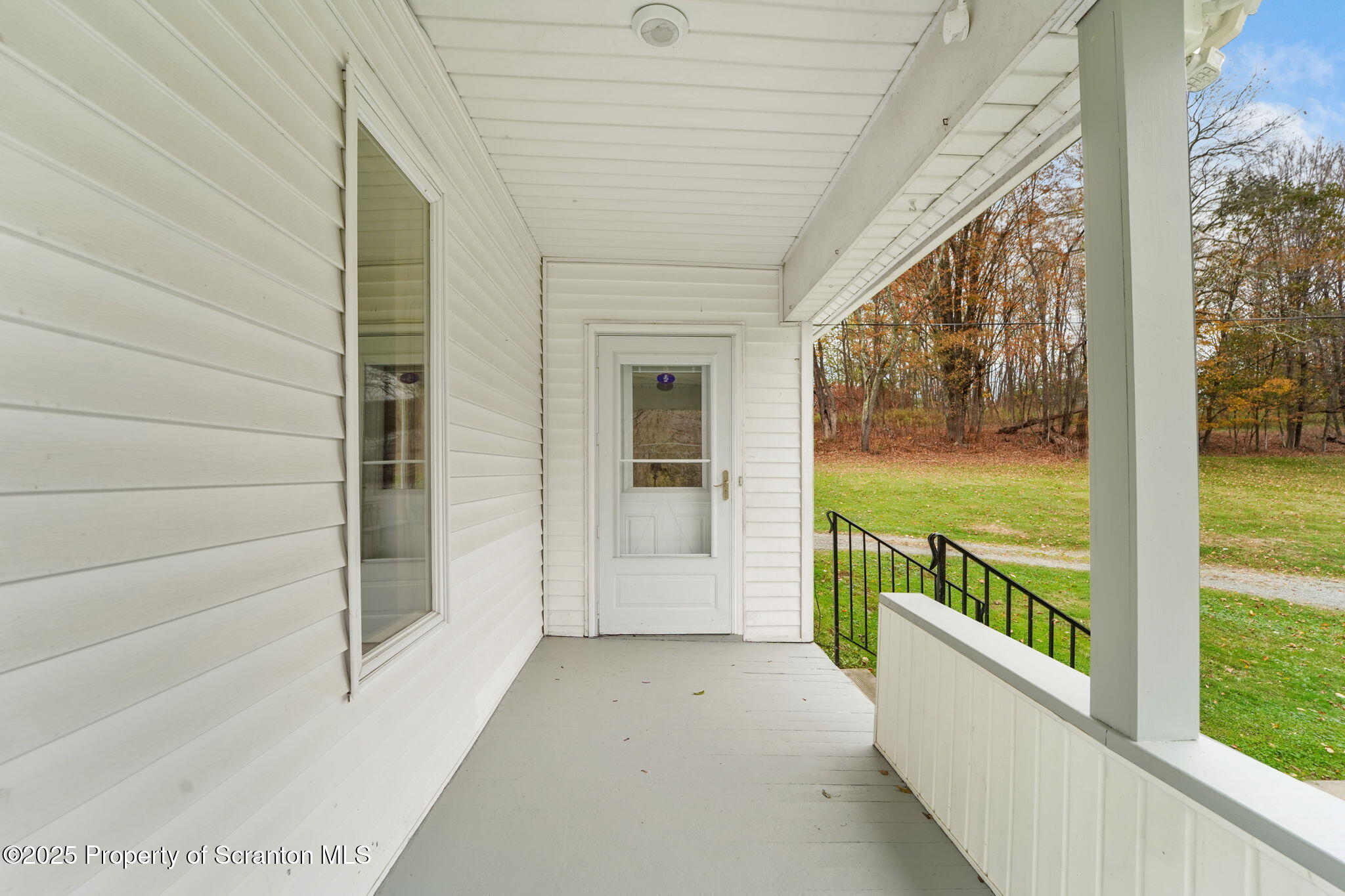 117 Church Road Harford, PA 18823 - Photo 6 of 35 a view of a porch with a table and chairs