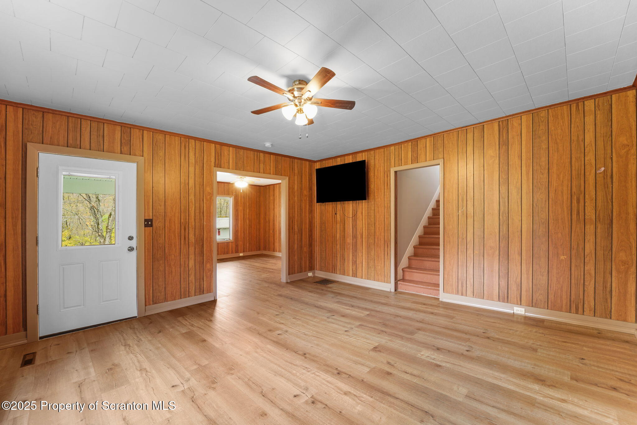 117 Church Road Harford, PA 18823 - Photo 7 of 35 wooden floor in an empty room with a window