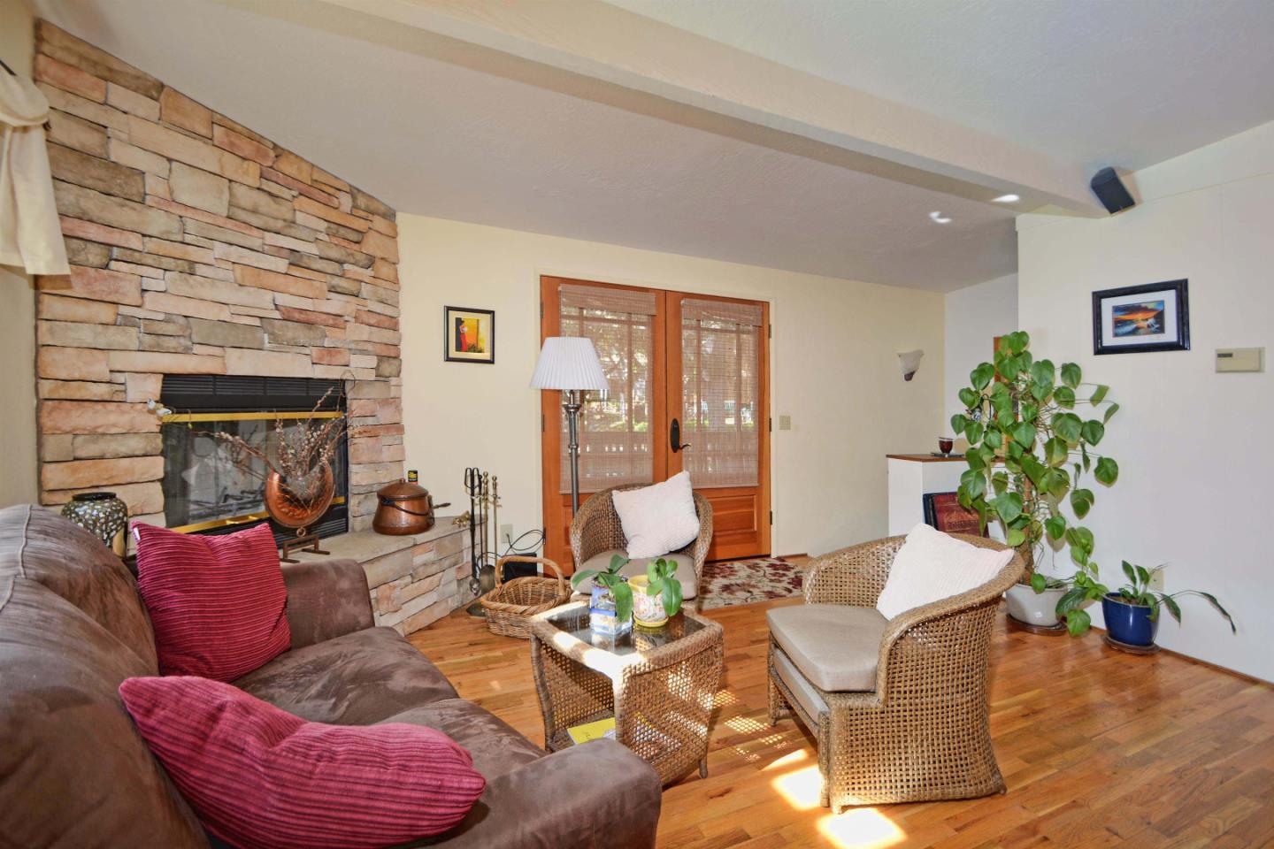 55 Paso Cresta Carmel Valley, CA 93924 - Photo 12 of 26 a living room with furniture flowerpot and wooden floor