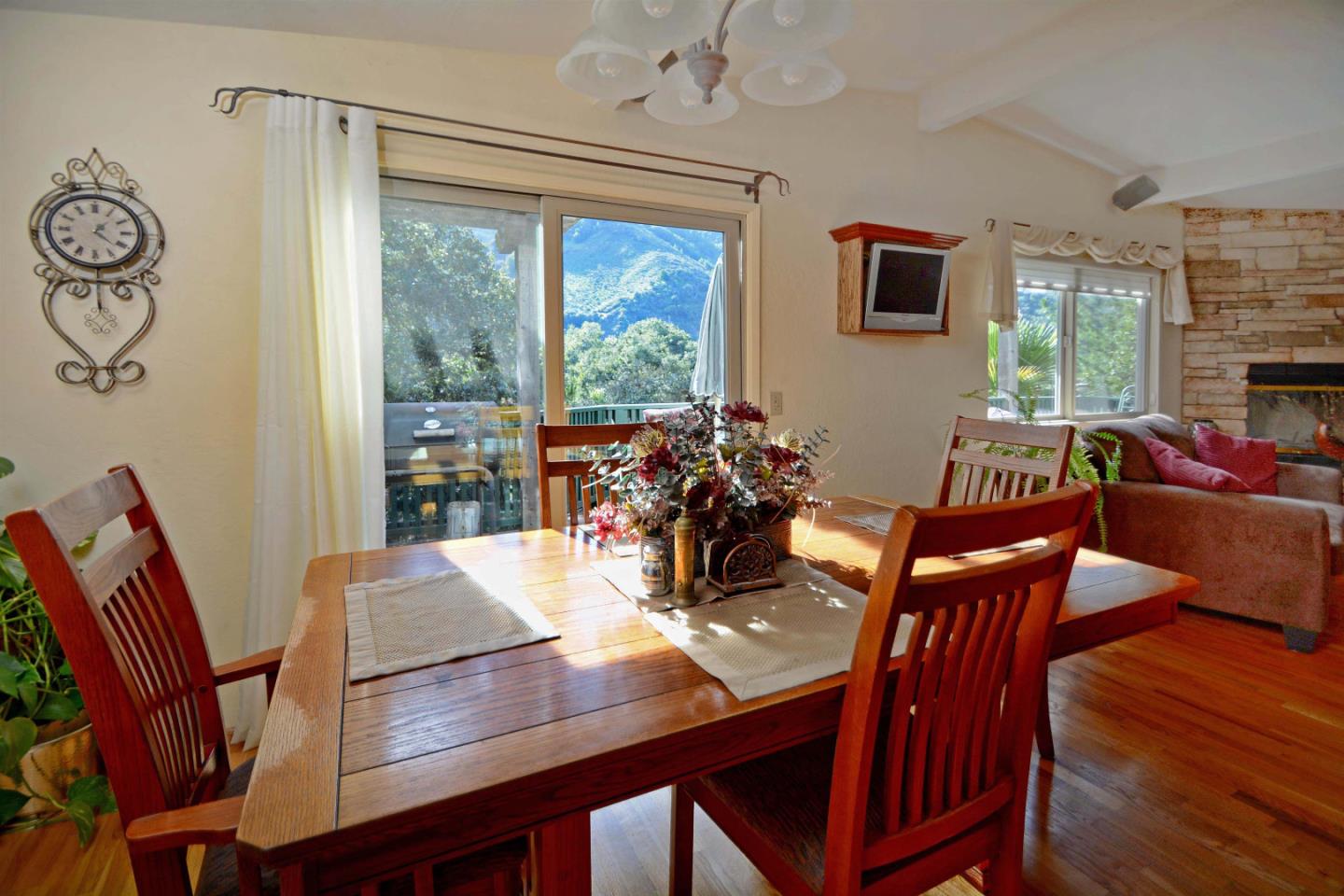 55 Paso Cresta Carmel Valley, CA 93924 - Photo 15 of 26 a view of a dining room with furniture window and outside view
