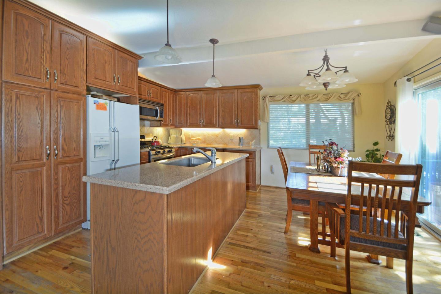 55 Paso Cresta Carmel Valley, CA 93924 - Photo 26 of 26 a kitchen with stainless steel appliances granite countertop a sink a stove and a refrigerator