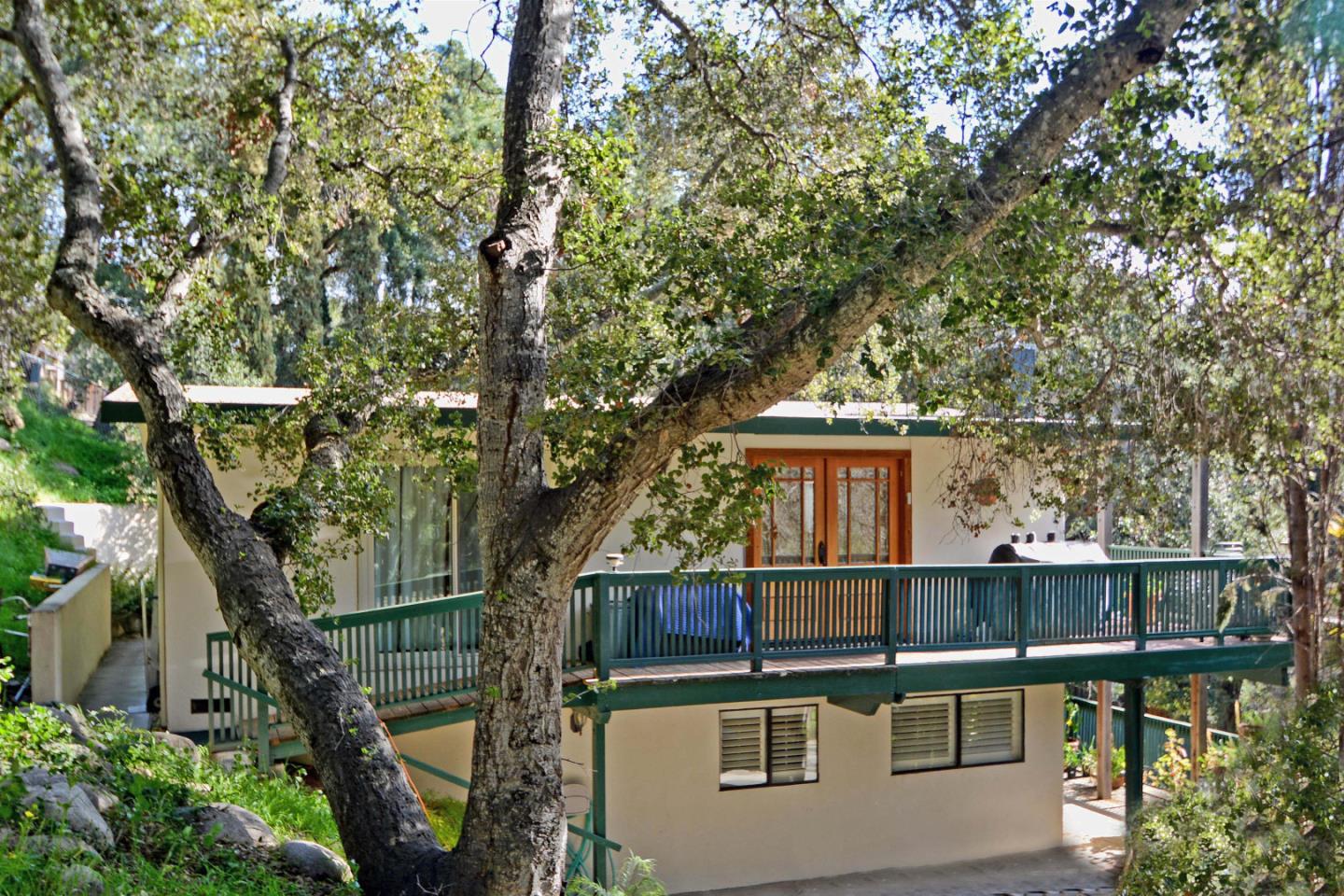 55 Paso Cresta Carmel Valley, CA 93924 - Photo 4 of 26 front view of a house with a small yard