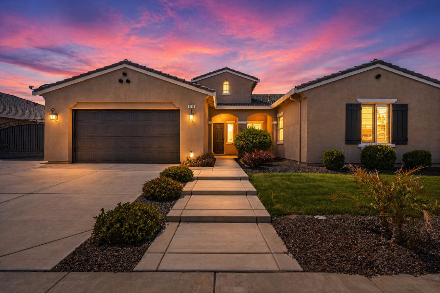 3368 North Discovery Way Hanford, CA 93230 - Photo 1 of 43 a front view of a house with a yard