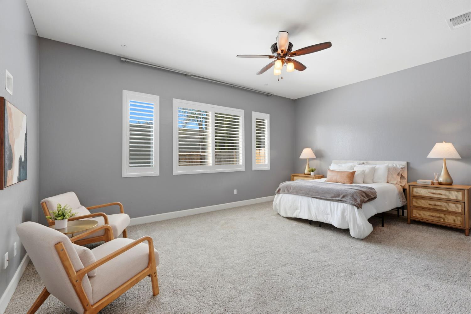 3368 North Discovery Way Hanford, CA 93230 - Photo 21 of 43 a spacious bedroom with bed and a window