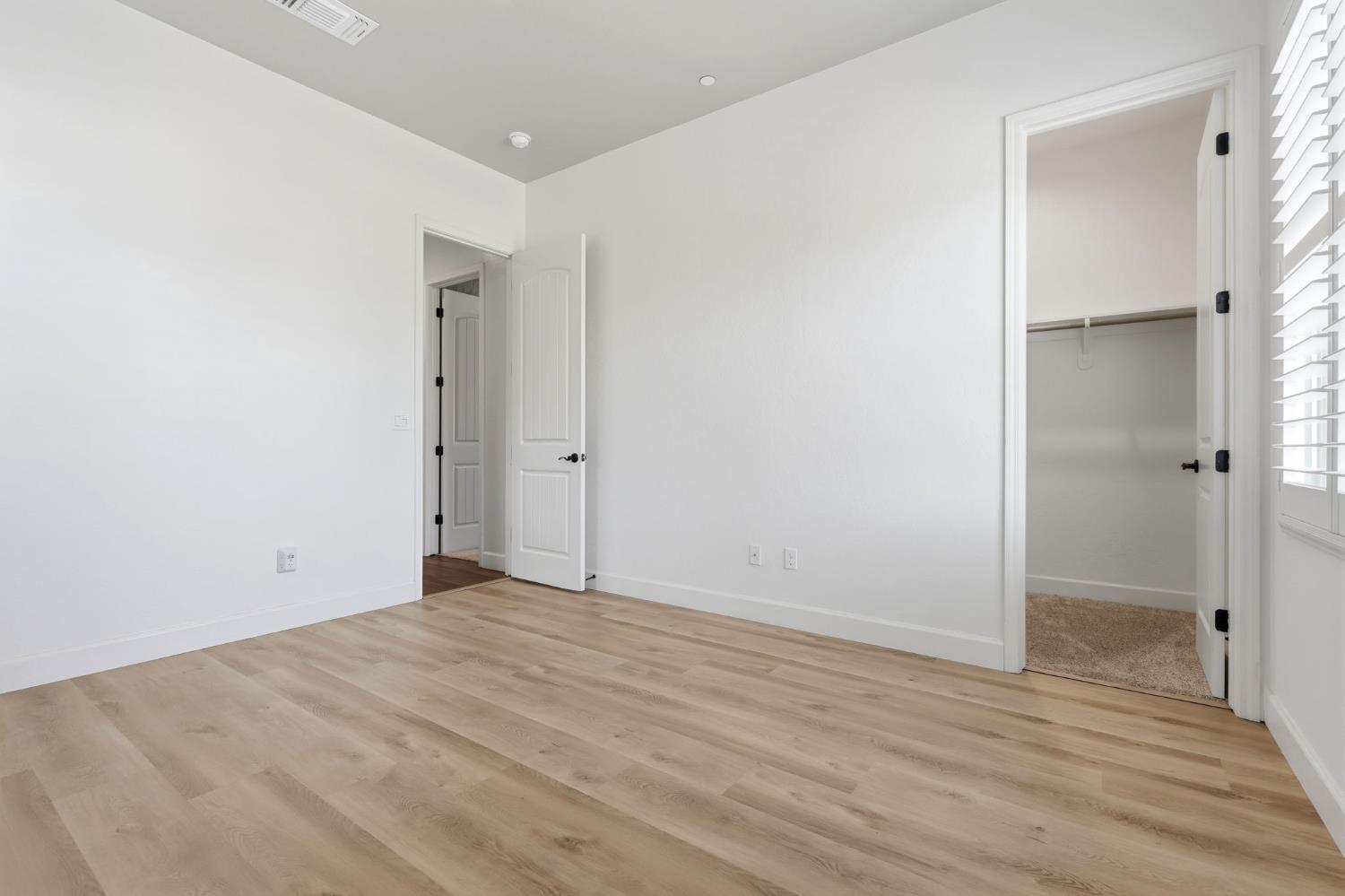 3368 North Discovery Way Hanford, CA 93230 - Photo 29 of 43 wooden floor in an empty room