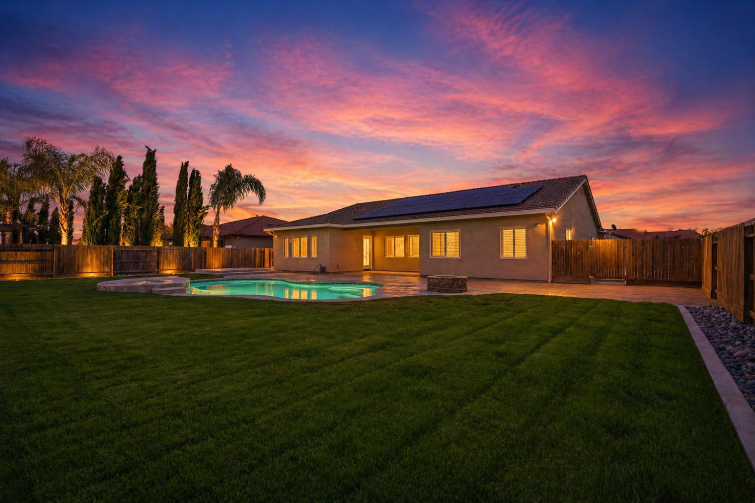 3368 North Discovery Way Hanford, CA 93230 - Photo 3 of 43 a front view of a house with a yard