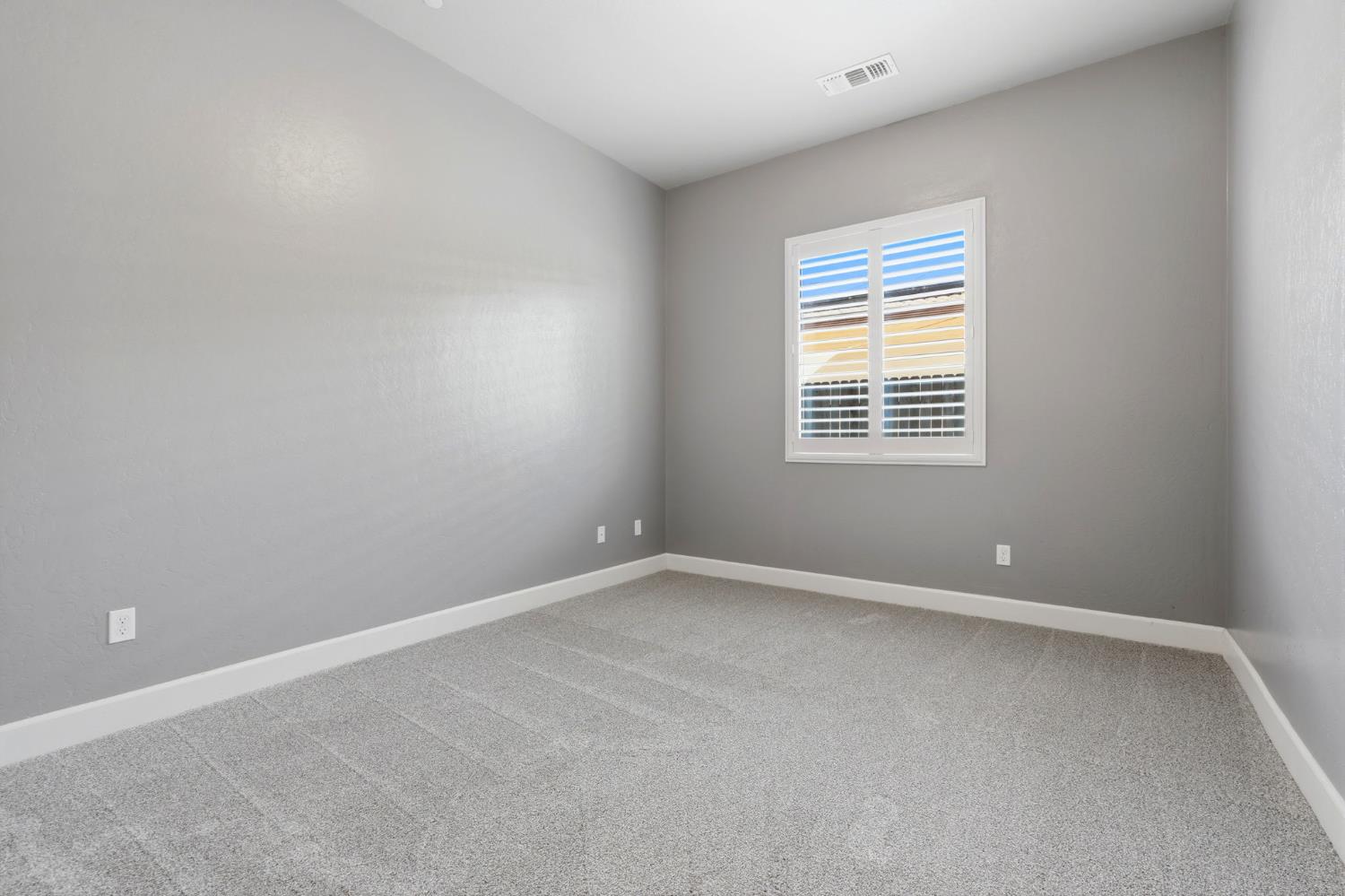 3368 North Discovery Way Hanford, CA 93230 - Photo 35 of 43 a view of an empty room with a window