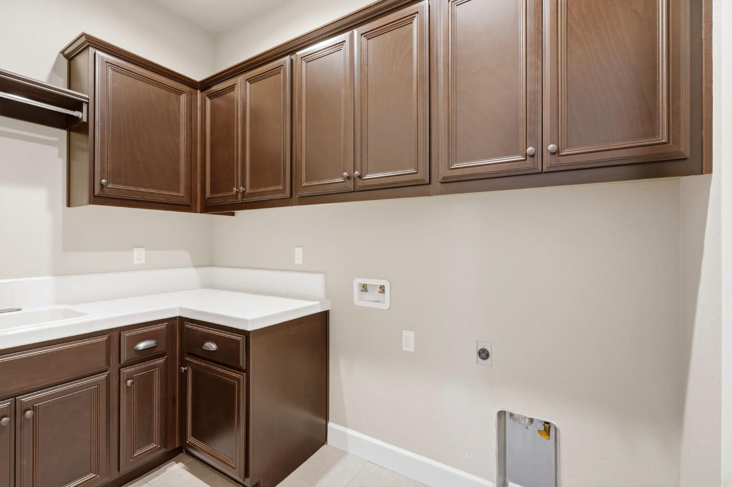 3368 North Discovery Way Hanford, CA 93230 - Photo 37 of 43 a kitchen with a sink and cabinets