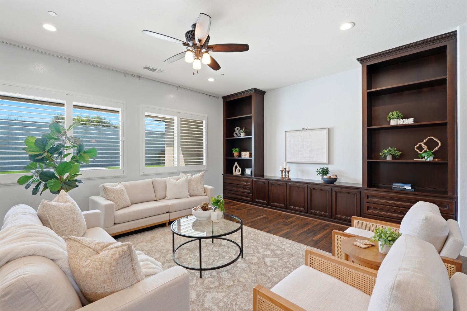 3368 North Discovery Way Hanford, CA 93230 - Photo 8 of 43 a living room with furniture potted plant and window