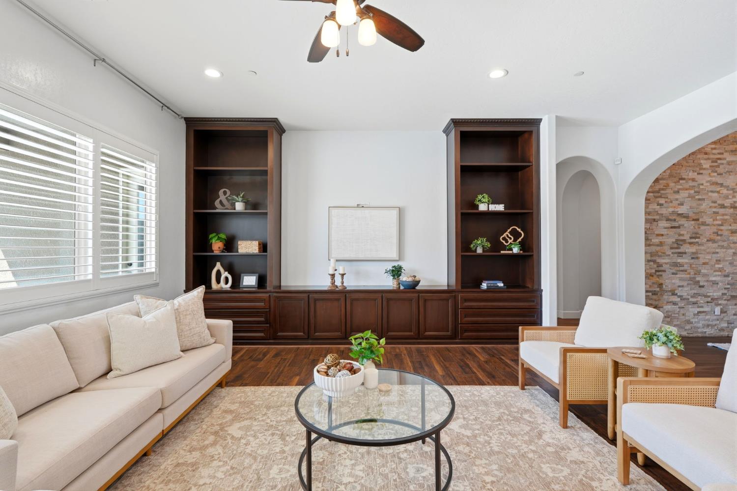 3368 North Discovery Way Hanford, CA 93230 - Photo 10 of 43 a living room with furniture and a large window