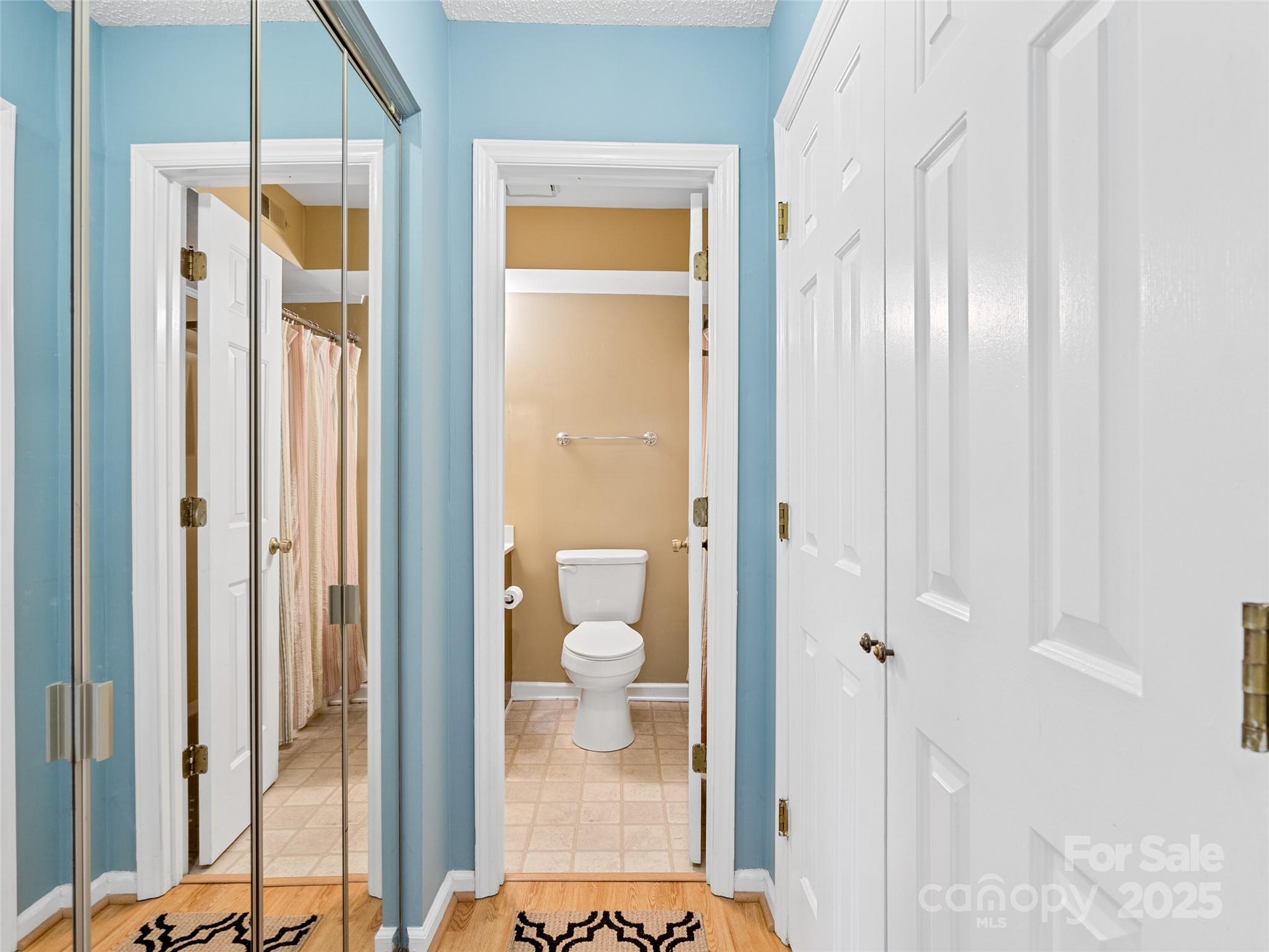 110 Heywood Road, Unit 17C Arden, NC 28704 - Photo 16 of 26 a bathroom with a glass shower door and a bathroom
