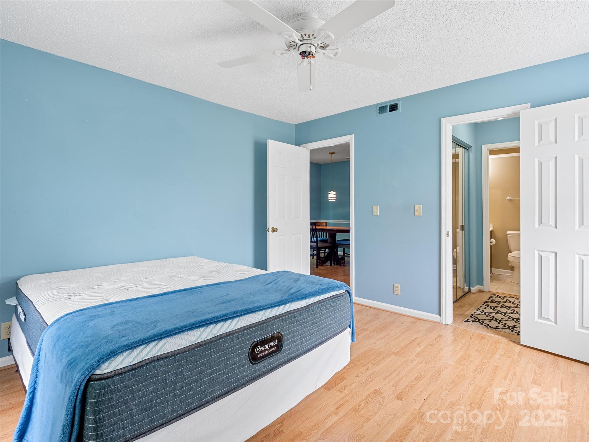 110 Heywood Road, Unit 17C Arden, NC 28704 - Photo 18 of 26 a room with a bed and a table