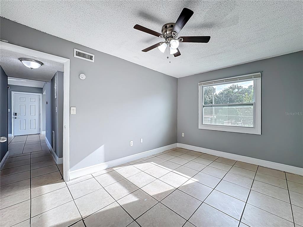 2753 L B McLeod Road, Unit D Orlando, FL 32805 - Photo 20 of 48 a view of an empty room with a window