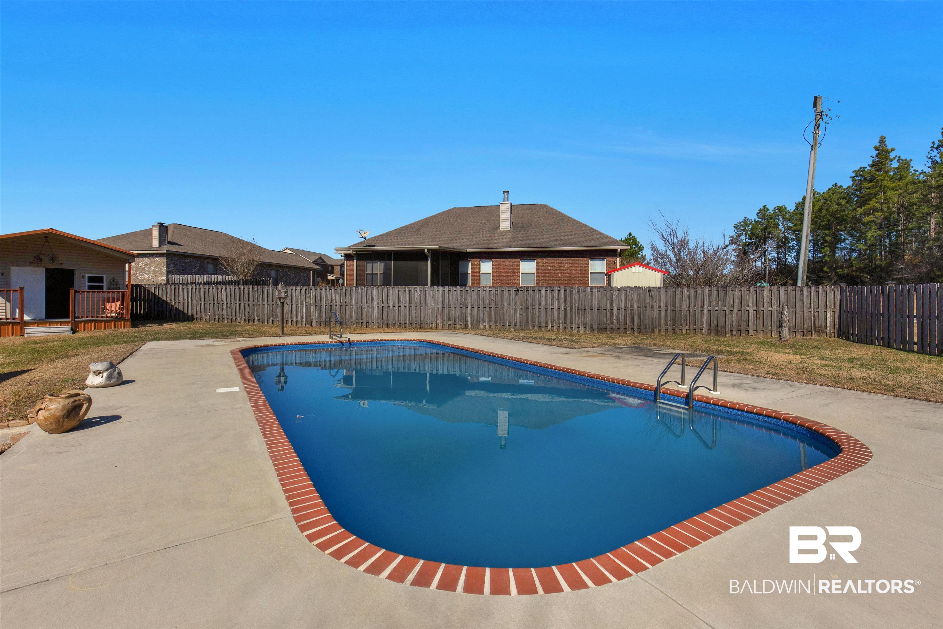 330 Allison Court Mobile, AL 36608 - Photo 22 of 27 View of pool with a patio