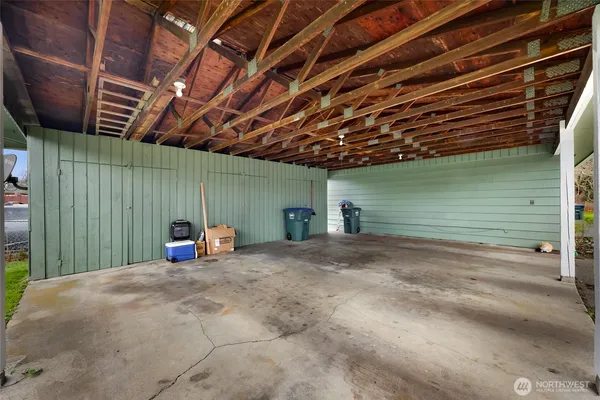 a view of a room with wooden walls