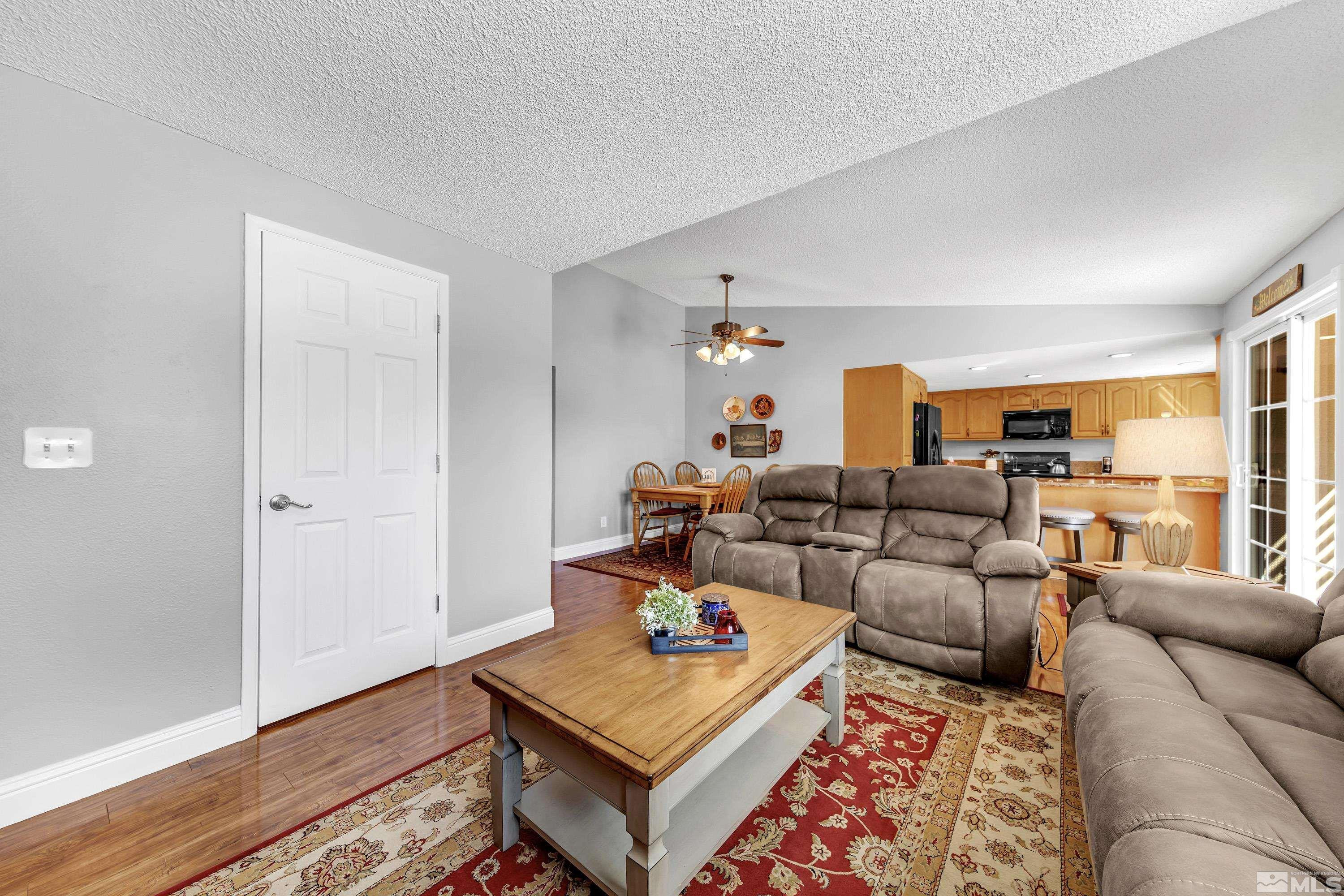 4900 Spring Drive Reno, NV 89502 - Photo 18 of 34 a living room with furniture and wooden floor