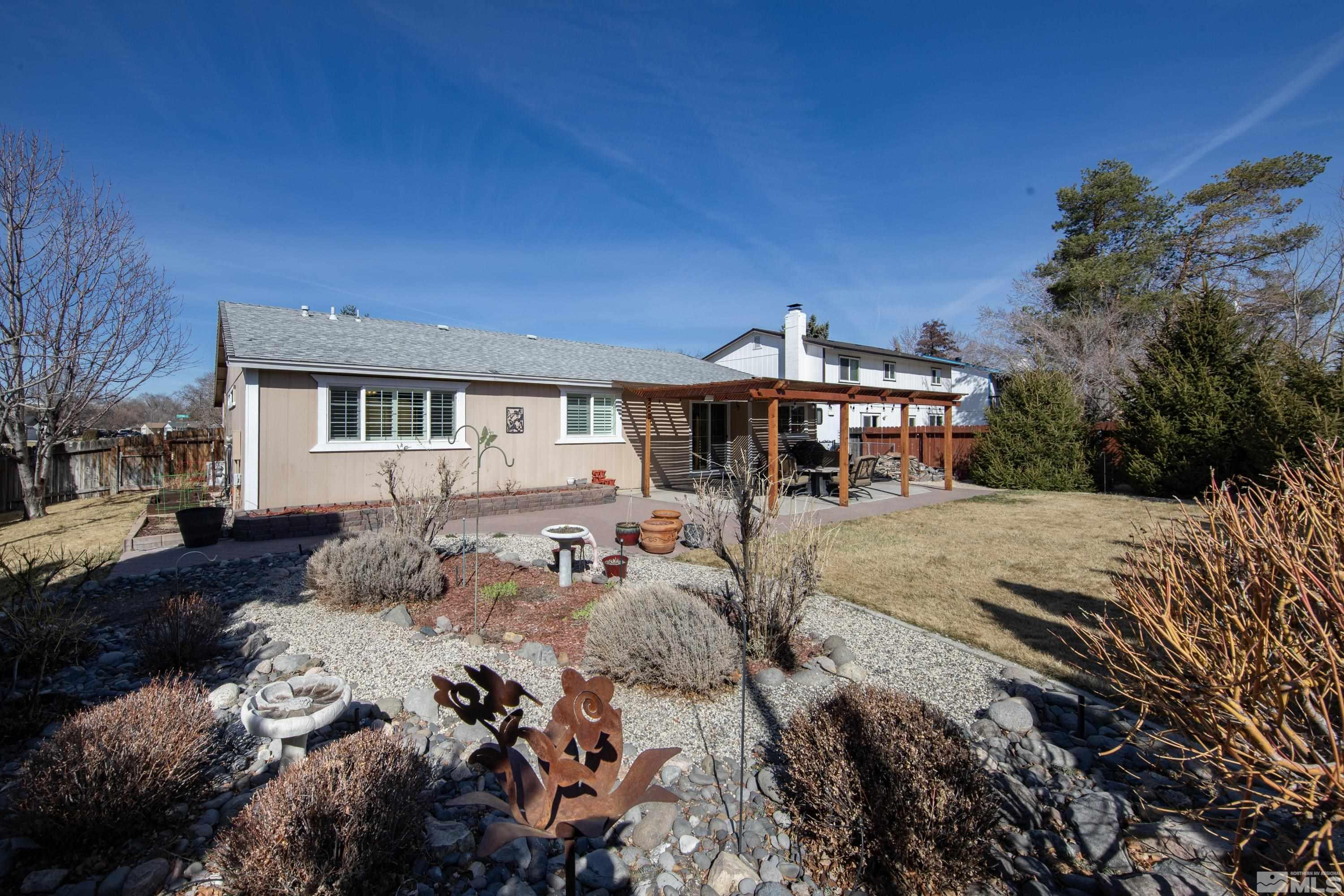 4900 Spring Drive Reno, NV 89502 - Photo 2 of 34 a front view of a house with a yard