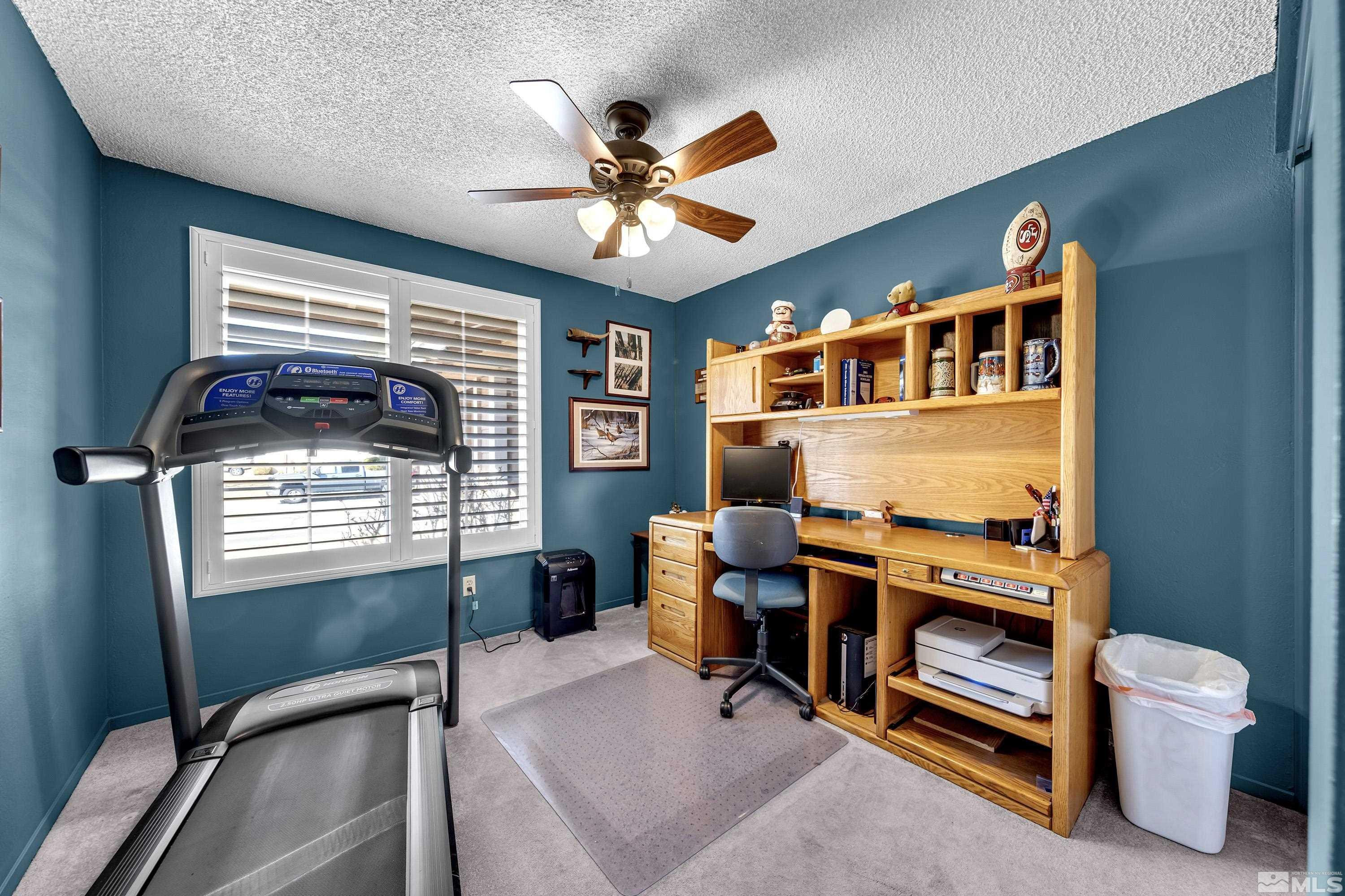 4900 Spring Drive Reno, NV 89502 - Photo 27 of 34 a work room with furniture and a window