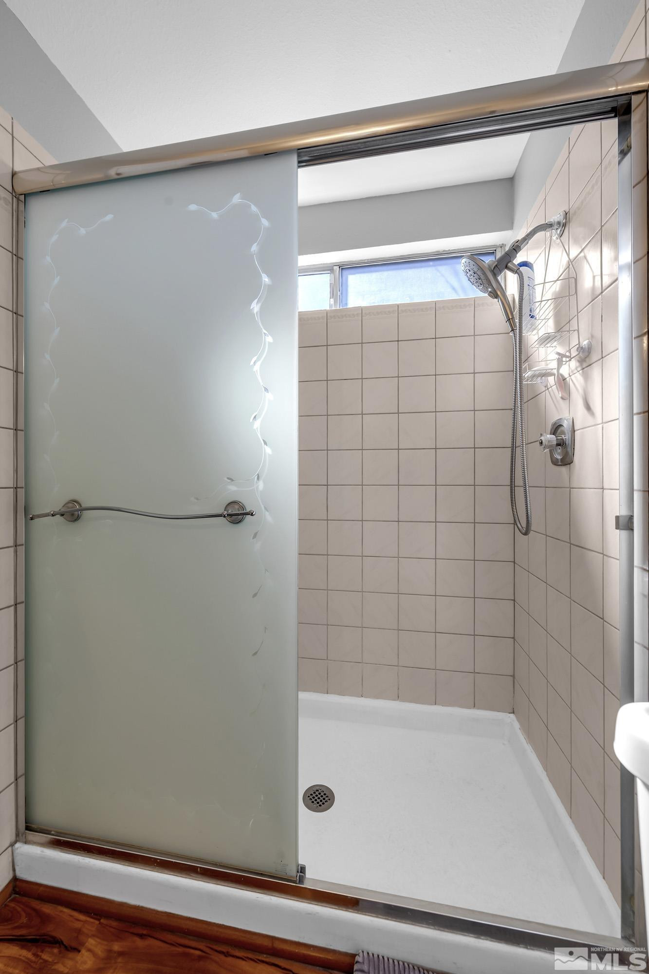 4900 Spring Drive Reno, NV 89502 - Photo 29 of 34 a bathroom with a shower and a bathtub