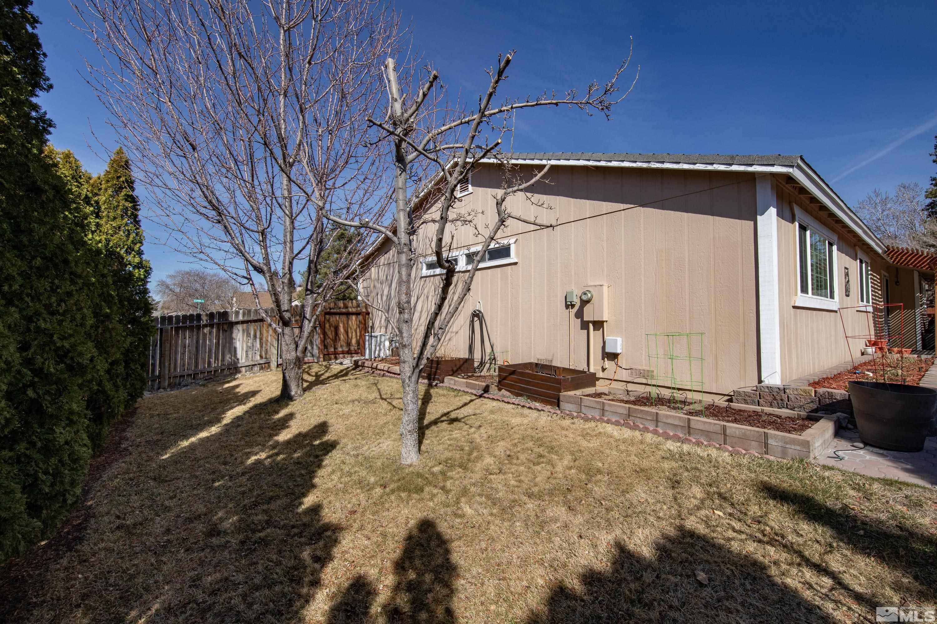 4900 Spring Drive Reno, NV 89502 - Photo 34 of 34 a view of a backyard with a tree