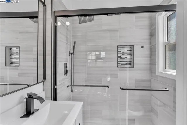 a view of a backyard with a patio and outdoor seating