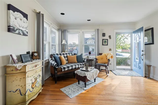 a living room with furniture or couch and a window