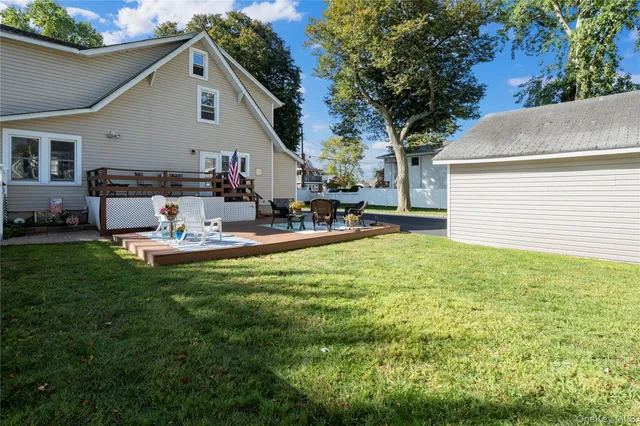 a front view of a building with garden