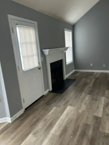 an empty room with windows