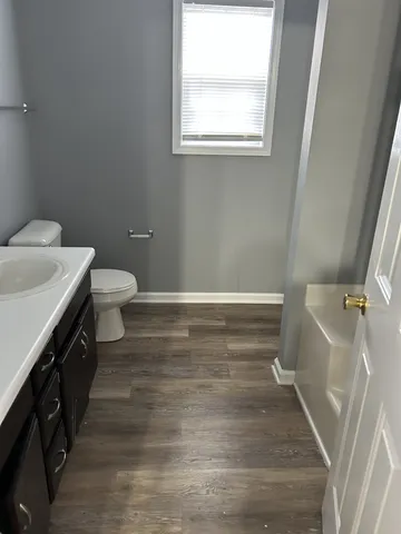 a bathroom with a sink and a toilet