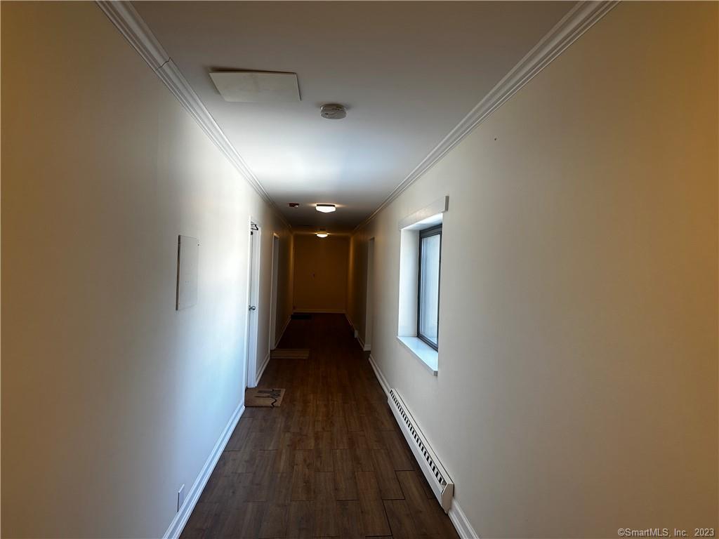 7 Winfield Street, Unit 2 Norwalk, CT 06855 - Photo 5 of 10 a view of hallway with stairs