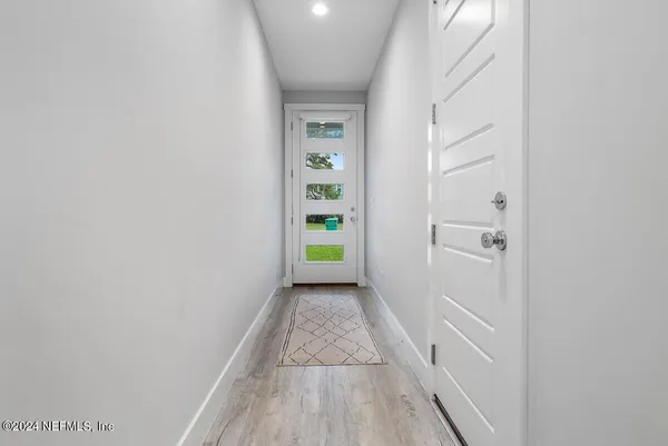 a view of hallway with stairs