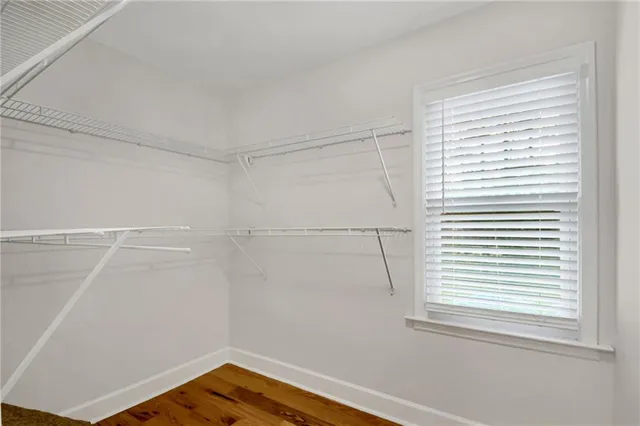 a view of a room that has a window