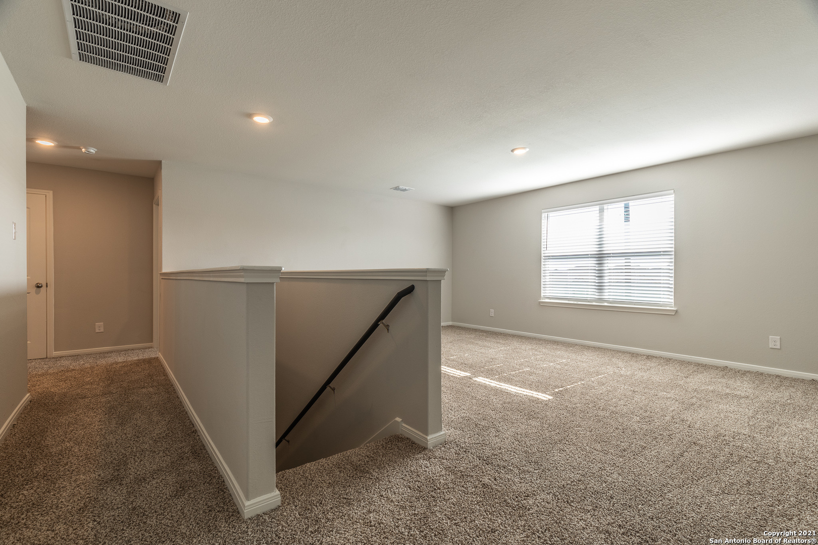9338 Espadrille Run Converse, TX 78109 - Photo 28 of 46 an empty room with windows
