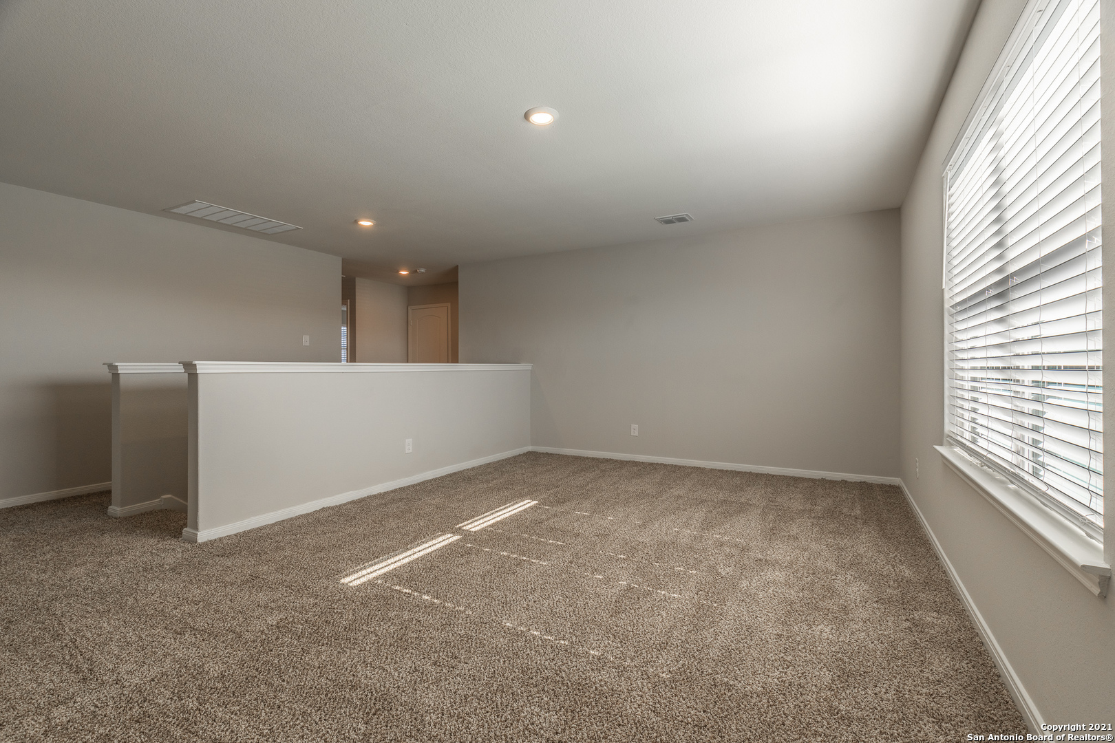 9338 Espadrille Run Converse, TX 78109 - Photo 29 of 46 an empty room with windows
