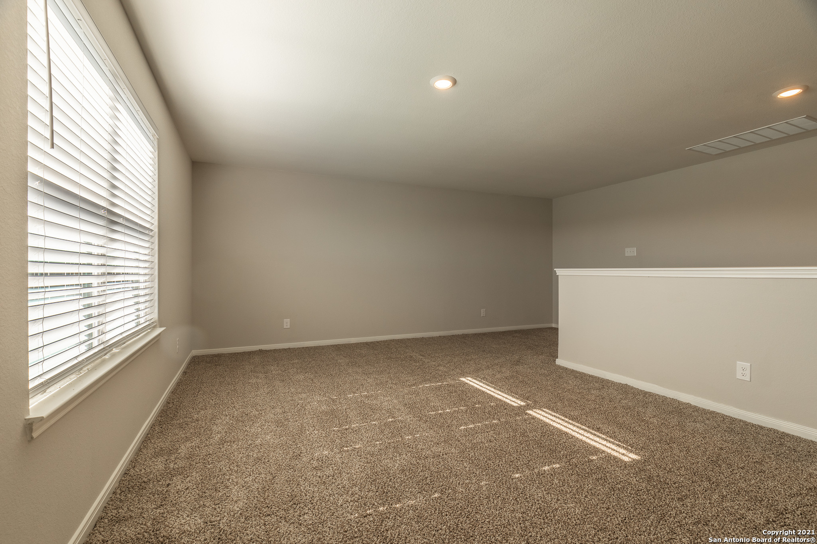 9338 Espadrille Run Converse, TX 78109 - Photo 30 of 46 an empty room with a window