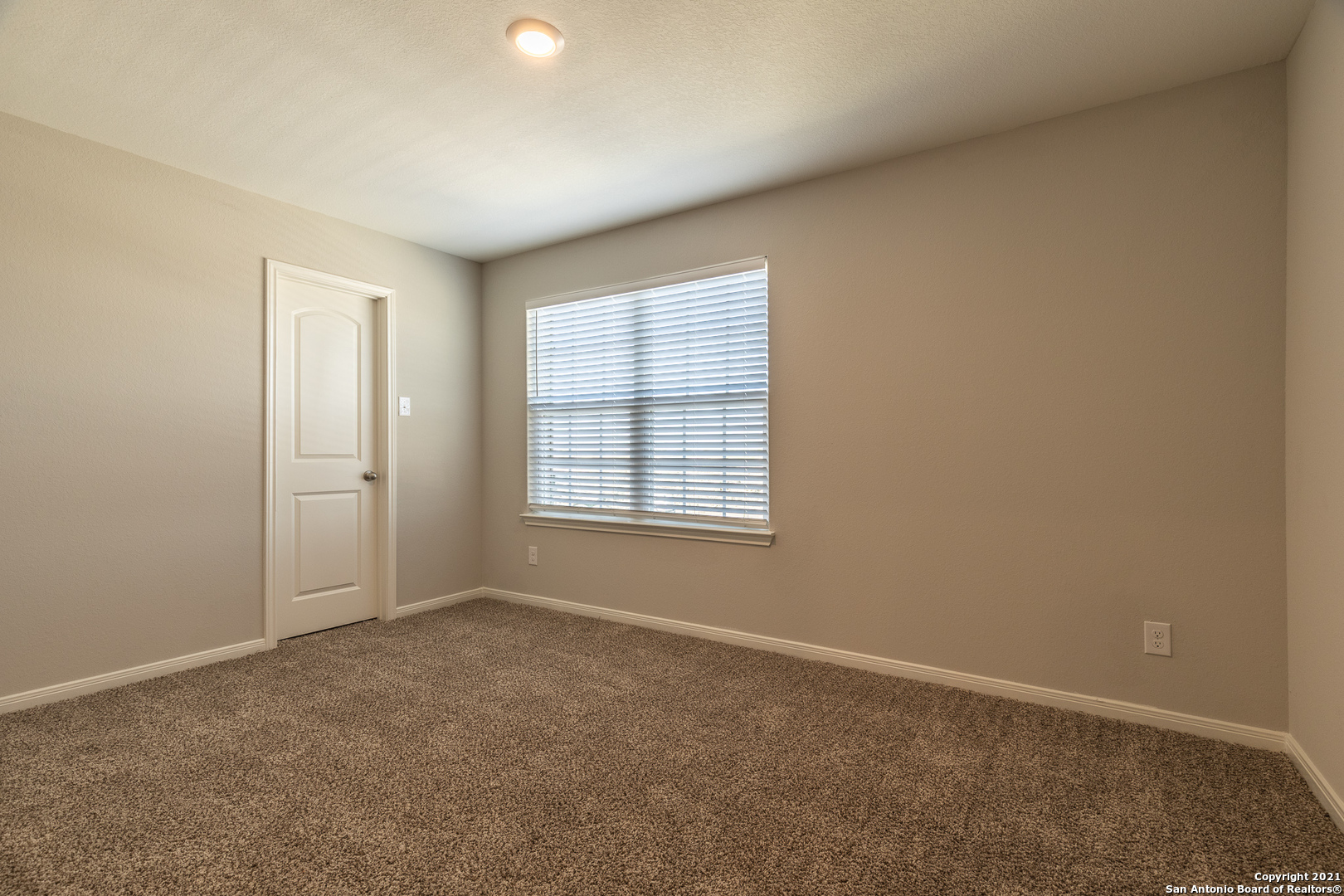 9338 Espadrille Run Converse, TX 78109 - Photo 34 of 46 an empty room with windows